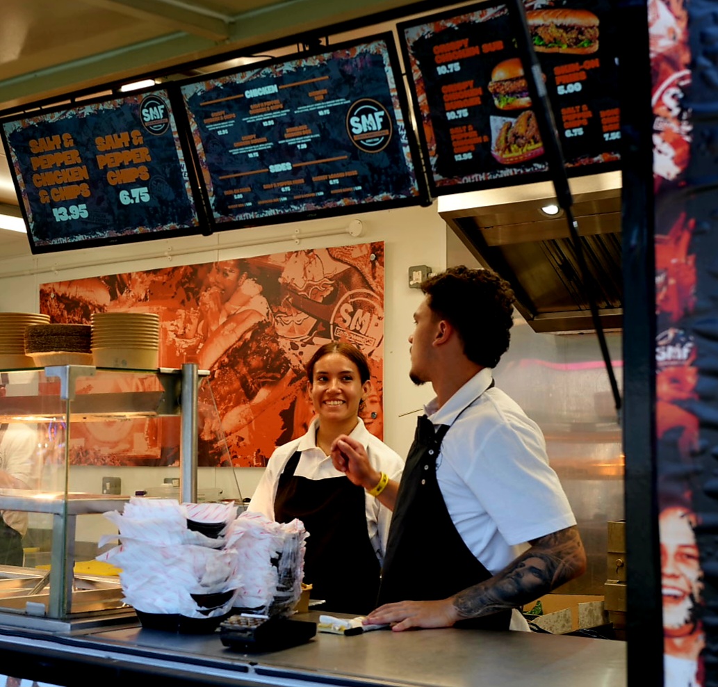 SMF team behind the food counter